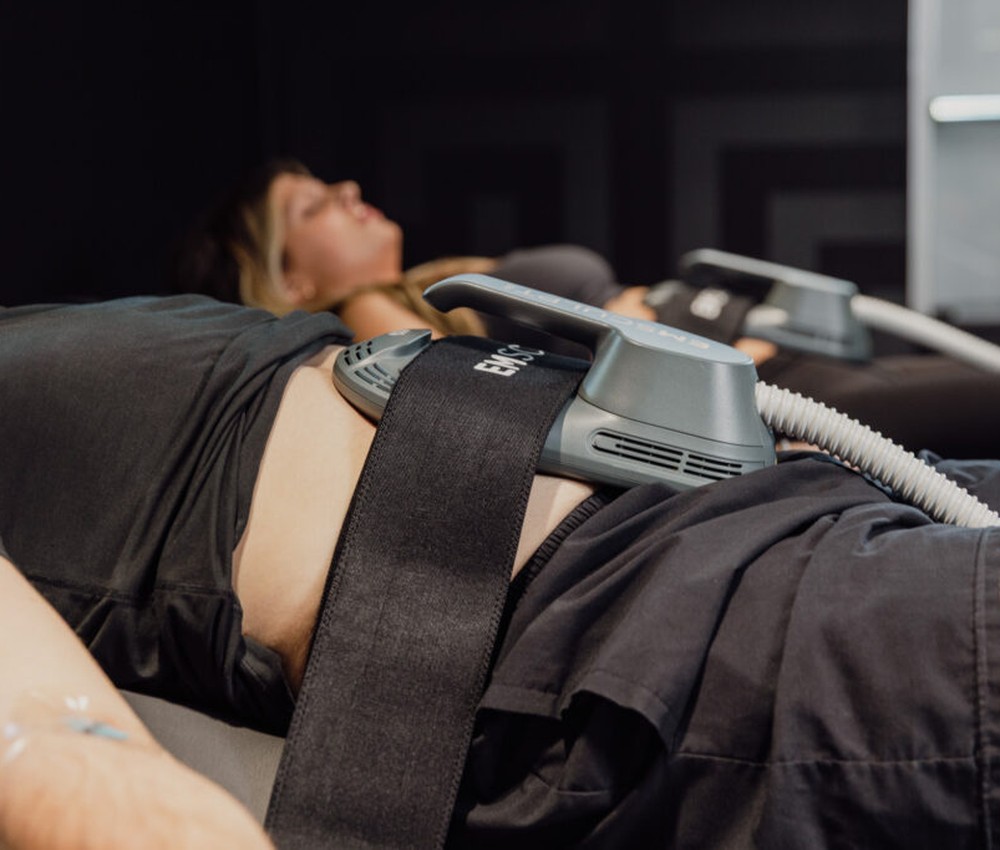 Client relaxing during a body contouring session